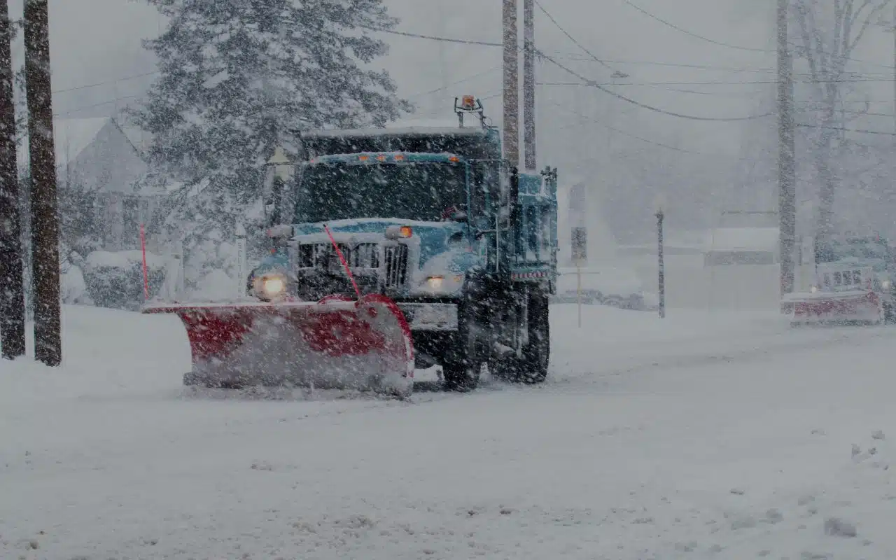 How Professional Snow Plowing Protects Your Commercial Lot, Driveways, and Landscaping Snow Plowing in WNY